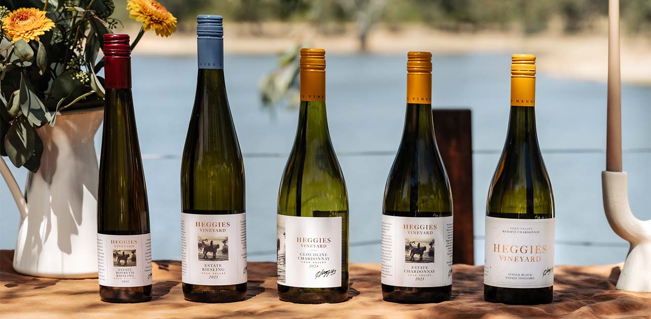 the full range of heggies vineyard wines, in front of the beautiful heggies dam
