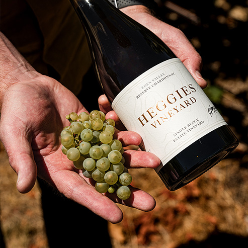 a bottle of our heggies reserve, alongside some freshly picked grapes from the reserve block of the vineyard